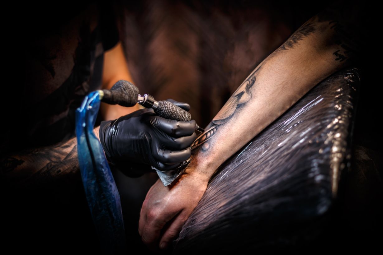 Tattoo artist at work in Amsterdam